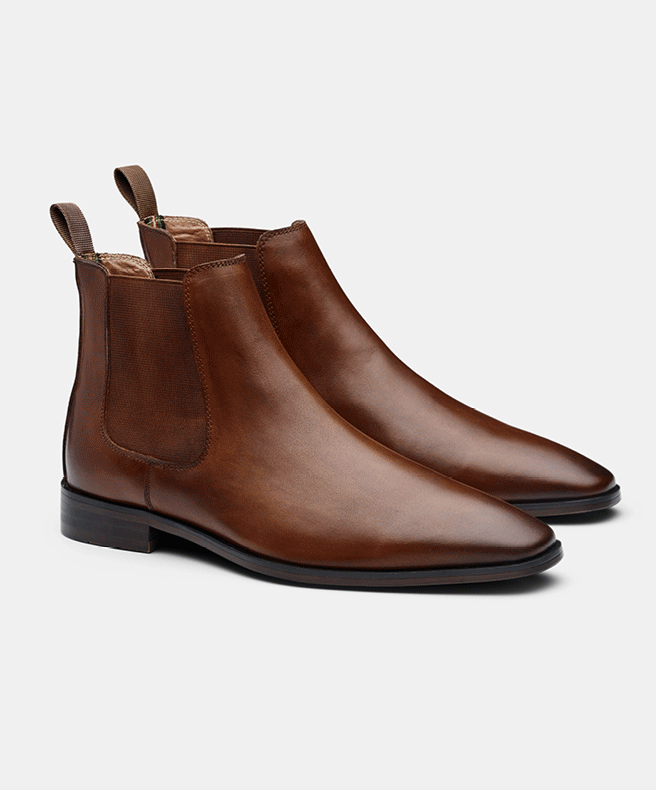 Chelsea Boots Brown and black leather chelsea boots side by side