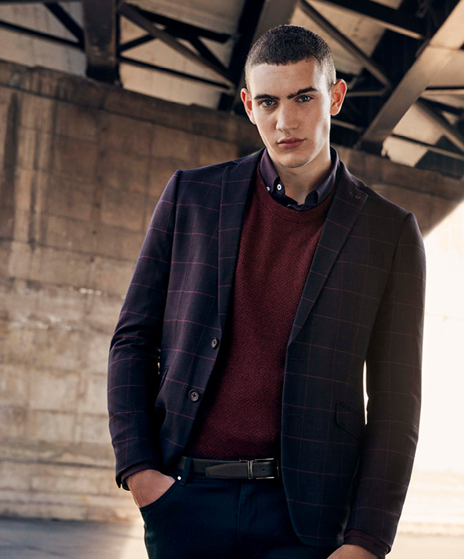 Outfit featuring burgundy night owl look Model wearing POLITIX burgundy night knit and navy Blazer