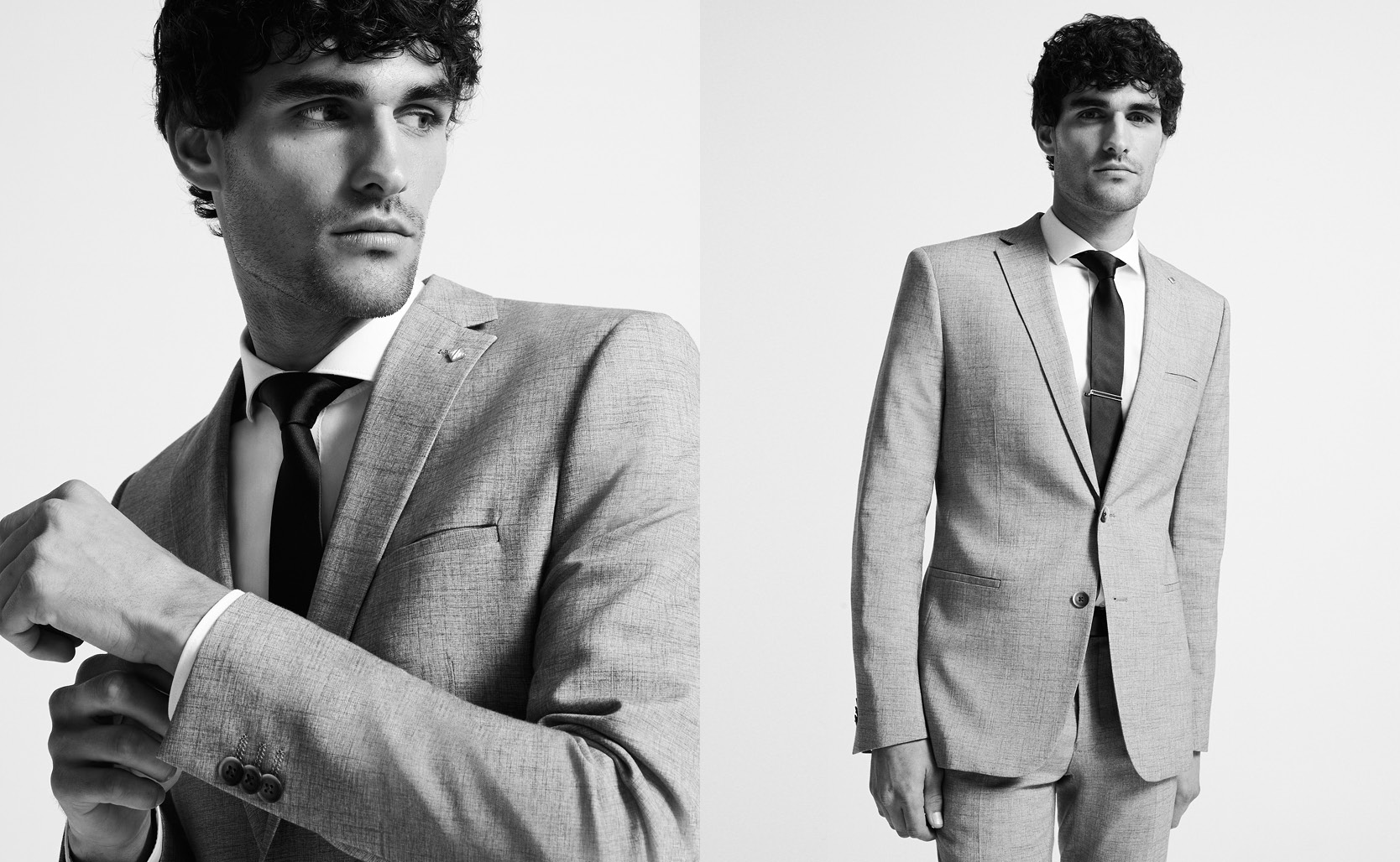 The Ultra Slim Fit Black and white image of model wearing the Stretch Marle Tailored Suit in Ultra Slim Fit