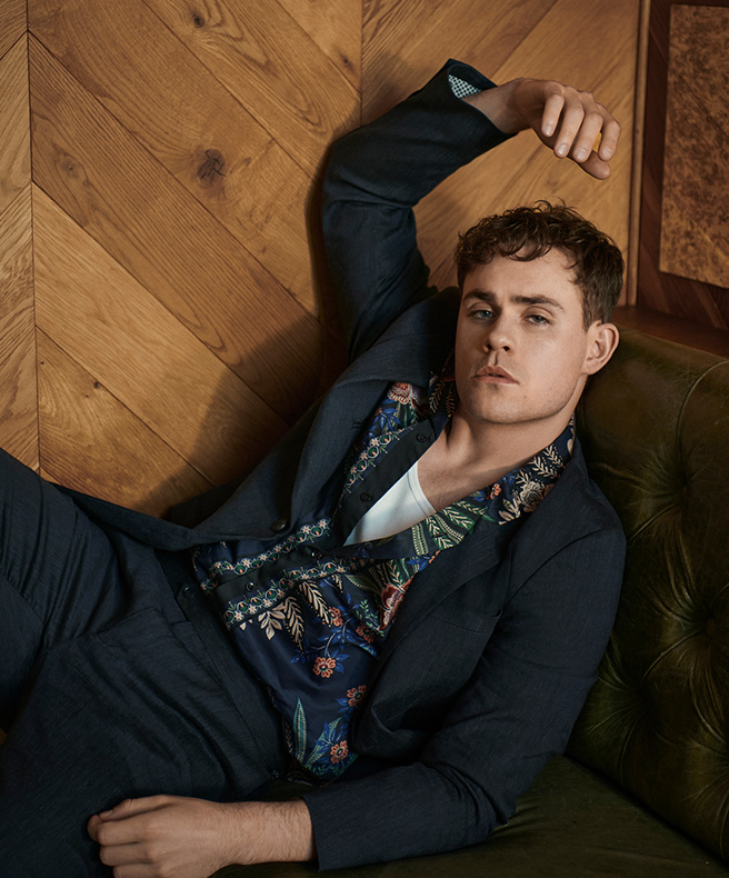 Collage of Dacre Montgomery in biscuit three piece suit and chocolate roll neck with one leg up on char and looking in to the camera Dacre Montgomery for The Gentle Man