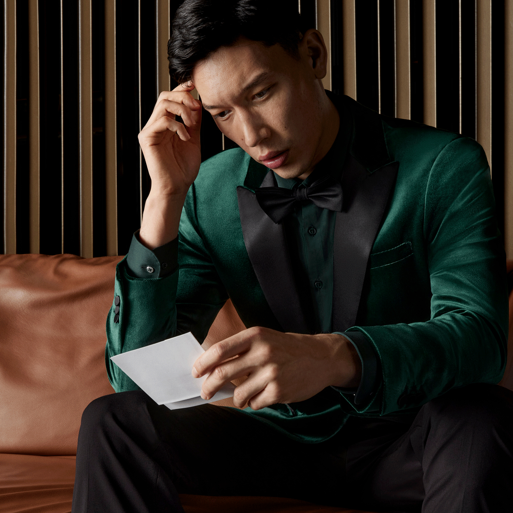Beat the nerves with a bold statement Model wearing POLITIX Jade Velvet Tuxedo jacket displaying nervous emotions
