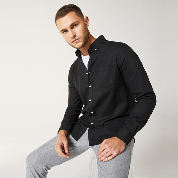 Model wearing a flannel shirt from Politix Model wearing a flannel shirt from Politix