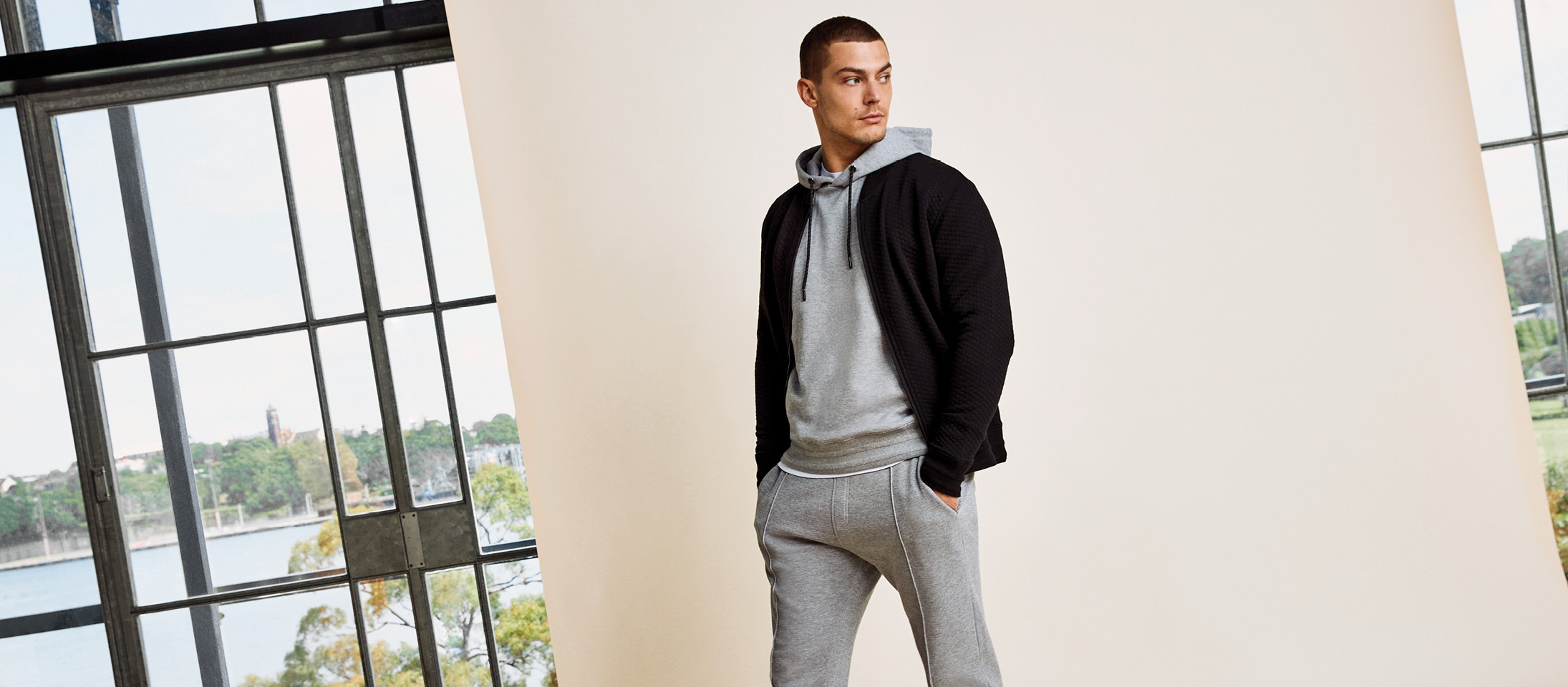 model wearing grey mens sweatsuit model wearing grey mens sweatsuit